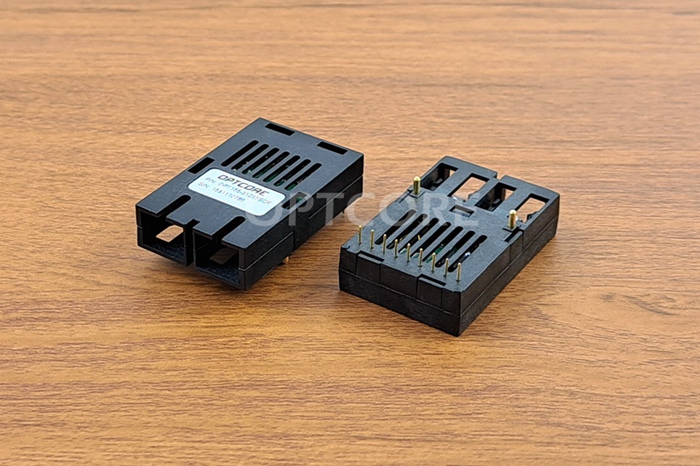1x9 Transceiver front and back on desk_700